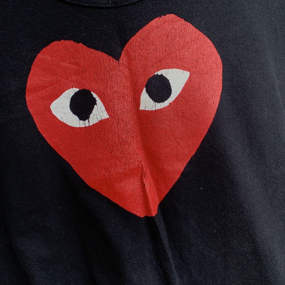 CDG heart tshirt (Category: Luxury Apparel) located in Manila. Submitted by _thrift.clothes._ (Listing ID 1465482886, Image 2). Description: Size:Large W:20 L:27 Issue crack print.