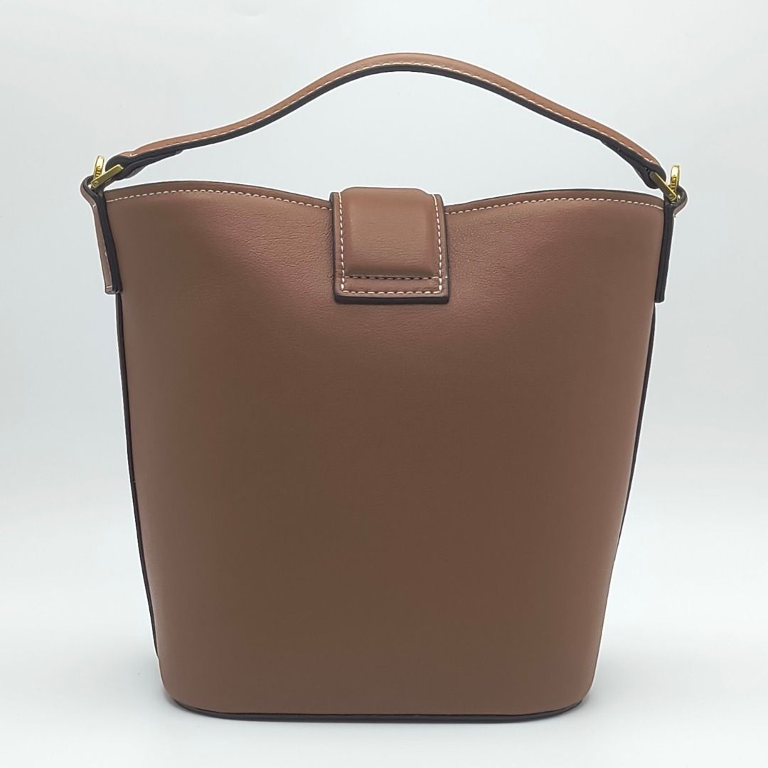 Celine Small Bucket Bag Louise Brown (Category: Luxury Bags & Wallets) located in Cebu City. Submitted by affordabagss (Listing ID 1465521233, Image 3). Description: Celine Small Bucket Louise crafted in smooth calfskin with signature gold-tone Triomphe hardware. Features a structured bucket silhouette with top handle and removable shoulder strap. Length: 16 cm Height: 19 cm Depth: 12 cm Colour: Brown Material(s): Smooth Calfskin Leather Hardware