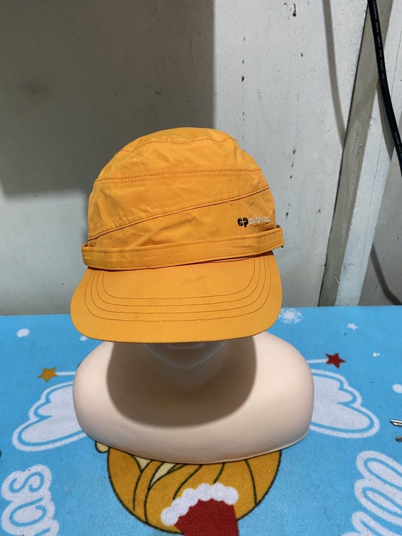 Center Pole Orange Hiking Cap Hat (Category: Caps & Hats) located in Manila. Submitted by resi.diaz (Listing ID 1465446324, Image 2). Description: - Brand: Center Pole - Color: Bright orange - Design: Structured visor with embroidered logo branding on front and back - Fit: Adjustable strap with metal hardware for a custom fit - Material: Lightweight and breathable - Condition: Clean stitching, well-maintained - Best for: Outdoor activities or cas