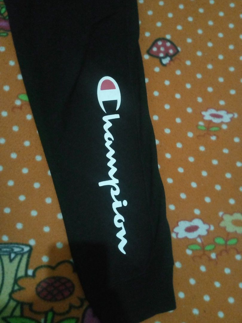 Champion Black Authentic Athleticwear Sweatpants Medium (Category: Joggers) located in Manila. Submitted by youngflower.c5c3c6 (Listing ID 1465413813, Image 3). Description: - Brand: Champion - Color: Black - Size: Medium (Made in El Salvador) - Design: Small embroidered C logo near the hip and large vertical script logo on the left leg - Features: Drawstring waist, elastic ankle cuffs, and cozy fleece interior - Condition: Excellent for casual w