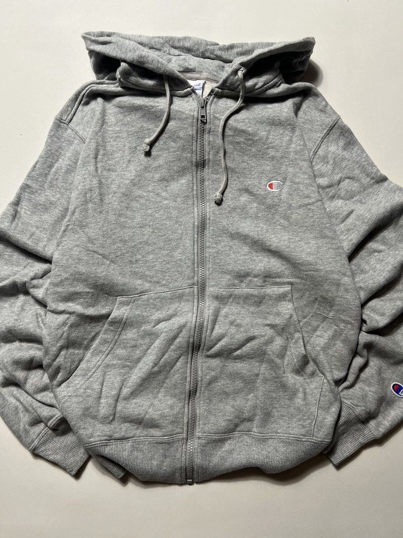 Champion grey hoodie (Category: Hoodies) located in Manila. Submitted by tripnimichael (Listing ID 1465458923, Image 2). Description: Size- Large Width-21 Length- 25 Issue-None .
