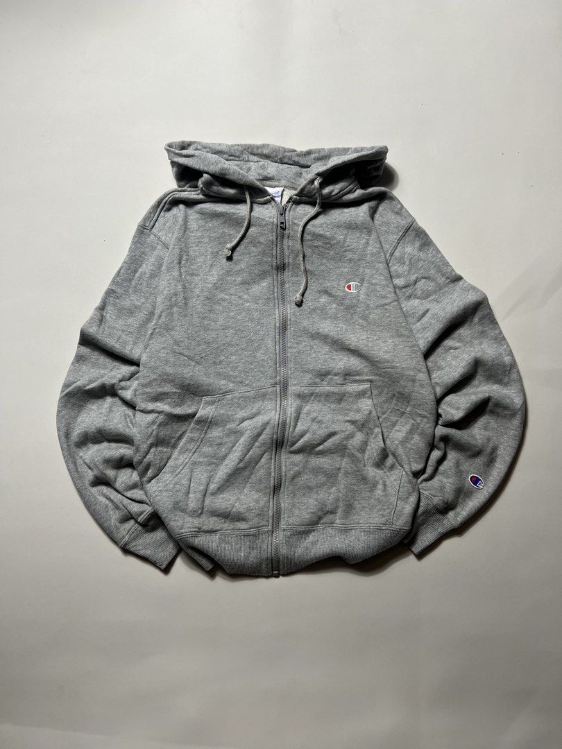 Champion grey hoodie (Category: Hoodies) located in Manila. Submitted by tripnimichael (Listing ID 1465458923, Image 1). Description: Size- Large Width-21 Length- 25 Issue-None .