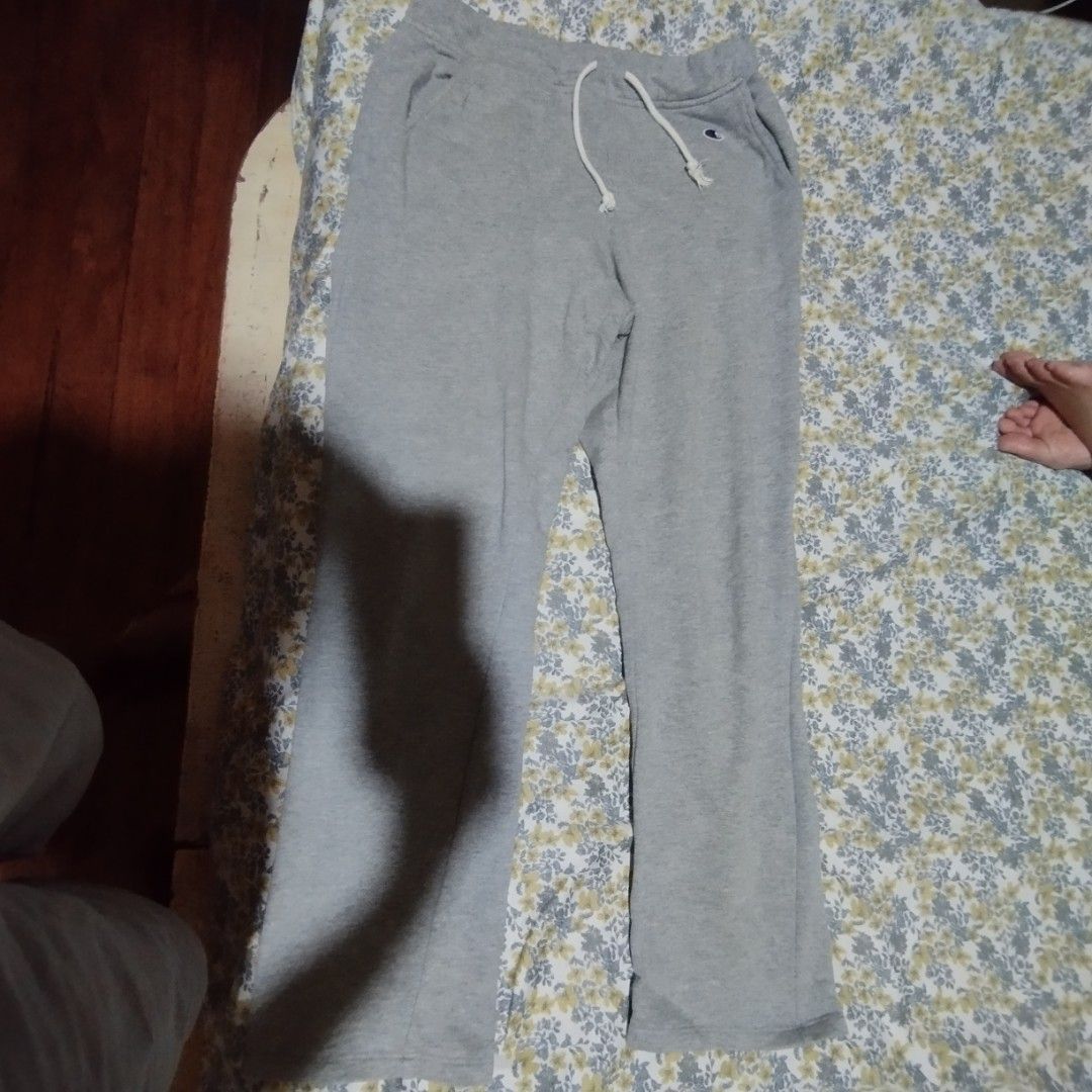 Champion grey sweatpants medium (Category: Other Bottoms) located in Manila. Submitted by lene48 (Listing ID 1465472462, Image 2). Description: - Brand/Model: Champion grey sweatpants - Size: Medium, 30 to 32 waist - Fit & Comfort: Super comfortable fleece material with a secure, tight elastic drawstring waistband - Pockets: Convenient side pockets and one right back pocket - Condition: Clean overall, well-maintained - Style: Casual everyday jogg