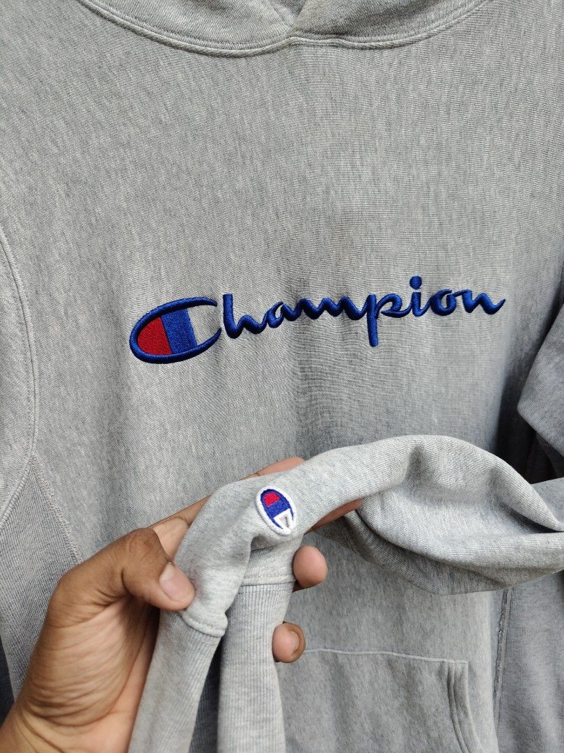 Champion Script hoodie (Category: Hoodies) located in Tacurong. Submitted by groovyf1nds (Listing ID 1465403823, Image 2). Description: Champion Script Hoodie Condition: Excellent Color rate: 10/10 Size: Large Dimes: 21.5 width, 30.5 length.