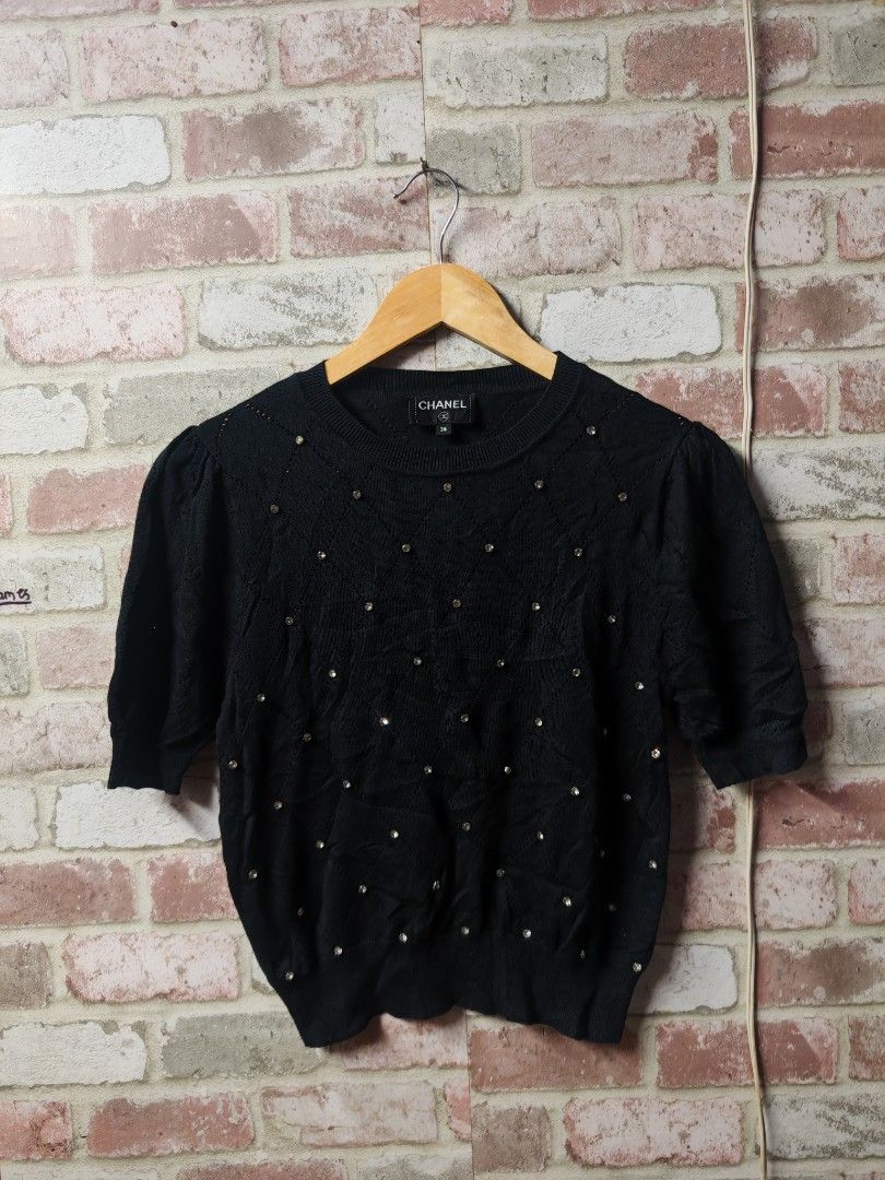Chanel black knitted cardigan (Category: Luxury Apparel) located in Santa Cruz. Submitted by ukayhuntworldwide (Listing ID 1465482176, Image 1). Description: .