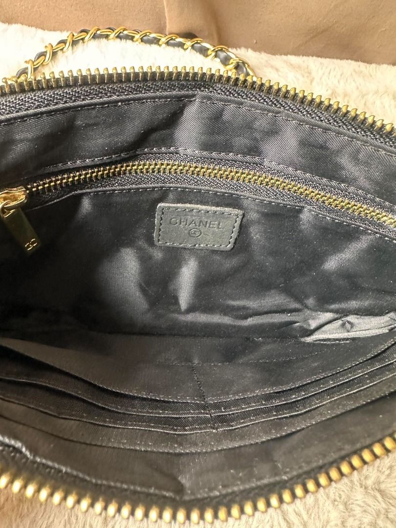Chanel Black Quilted Leather Shoulder Bag (Category: Luxury Bags & Wallets) located in Davao. Submitted by luckyturtle.aa6ccf (Listing ID 1465392589, Image 3). Description: - Style: Compact crossbody or shoulder bag - Exterior: Premium black quilted leather with gold-tone hardware - Strap: Gold chain interwoven with black leather - Closure: Top zipper with a chic gold Chanel logo charm - Interior: Black fabric lining with a convenient zippered po