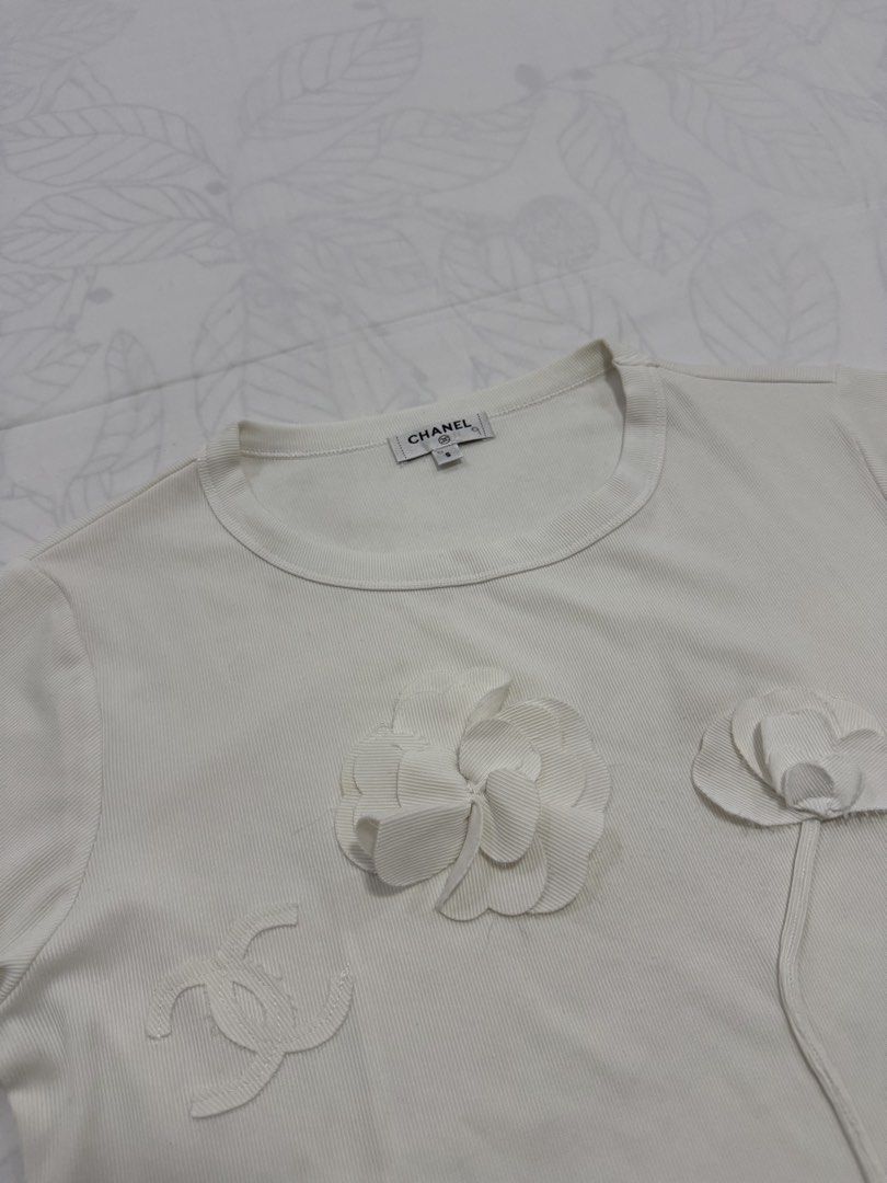 Chanel short-sleeve top (Category: Activewear) located in Taguig. Submitted by thesocialthrift (Listing ID 1465396635, Image 2). Description: For sale Chanel short-sleeve top ‎W-16.5 ‎L- 21.5 no flaws Excellent condition .