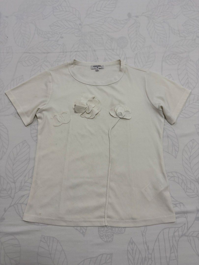 Chanel short-sleeve top (Category: Activewear) located in Taguig. Submitted by thesocialthrift (Listing ID 1465396635, Image 1). Description: For sale Chanel short-sleeve top ‎W-16.5 ‎L- 21.5 no flaws Excellent condition .