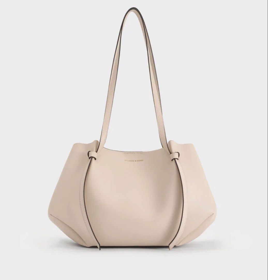Charles & Keith Calla tote bag Oat - Size L (Category: Tote Bags) located in Manila. Submitted by justshop.ph (Listing ID 1465549040, Image 1). Description: bought from Korea dust bag included.