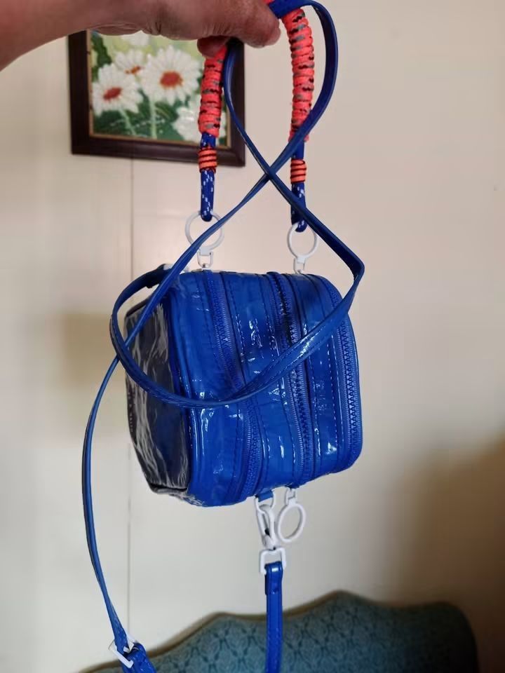 Charles and Keith nano bag (Category: Cross-body Bags) located in Angeles City. Submitted by mjshoppingretail (Listing ID 1465410190, Image 1). Description: Charles Keith nano bag.