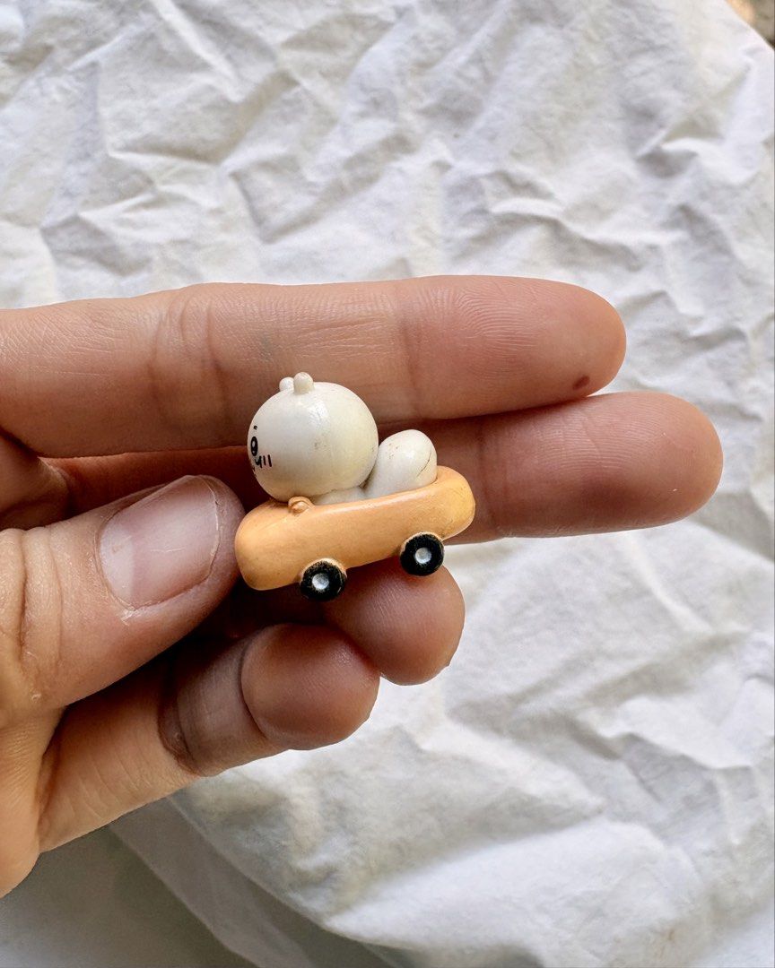Chiikawa Nagano Car Figurine (Category: Vehicle & Diecast Models) located in Tuguegarao City. Submitted by jasminecoll (Listing ID 1465537294, Image 2). Description: - Official Chiikawa collectible figure in an orange toy car - Genuine Nagano copyright stamped on the bottom - Adorable hand-painted facial expression and details - Miniature handheld size (just a few centimeters long) - Perfect gift or addition to any Chiikawa collection! -Location 