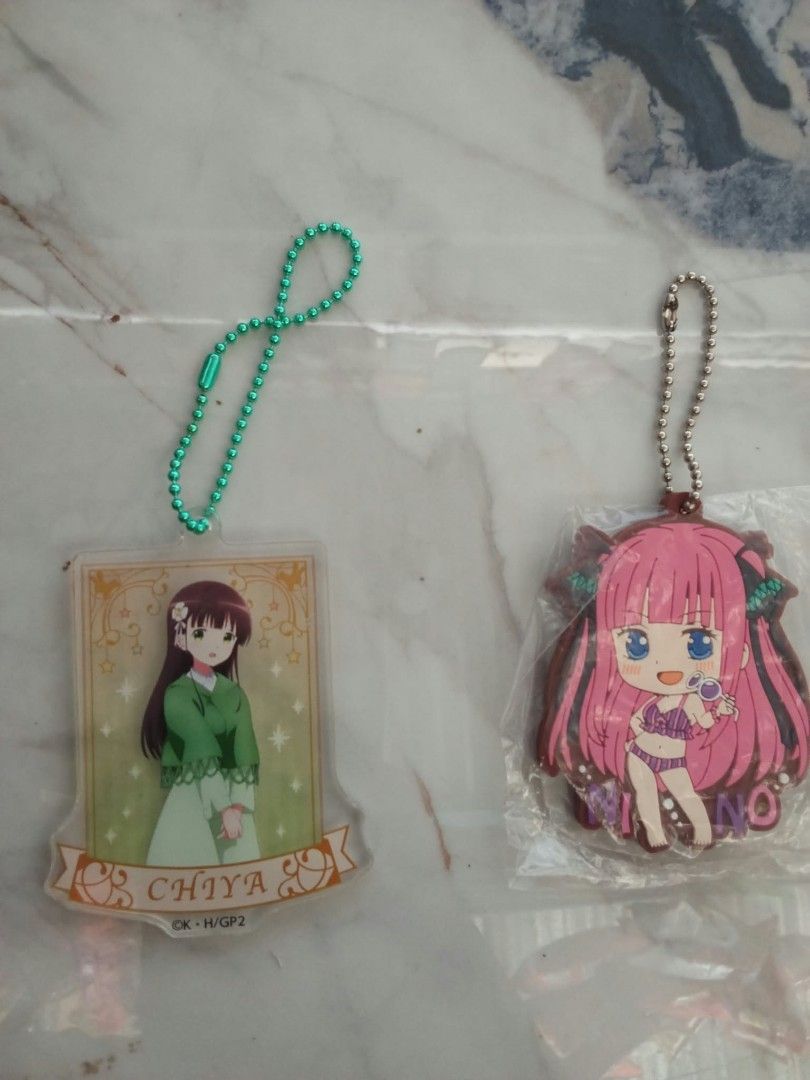 Chiya and Nino Anime Keychains (Category: Character Goods) located in Davao. Submitted by mengsmixitems (Listing ID 1465426854, Image 1). Description: - Set of 2 anime keychains sold together - Chiya: Acrylic plate with green ball chain - Nino (Quintessential Quintuplets): Swimsuit design, brand new inside clear packaging with silver ball chain - Condition: Clean and intact - Perfect for anime merch collectors.