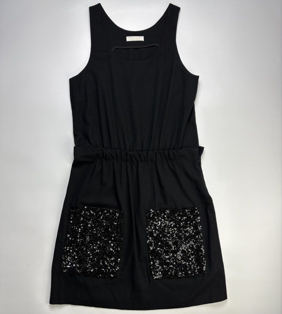 Chloe Phoebe Philo Wool Blend Sleeveless Dress (Category: Dresses) located in Cavite. Submitted by sc_rcity (Listing ID 1465562637, Image 1). Description: Tagged Size : 40 EU Women’s Authentic Like New No Flaw Made in France No Inclusion A classic sleeveless top with a unique, minimalist horizontal cutout detail right below the crew neckline.a gathered, comfortable elastic waist that gives way to a subtle bubble or shift silhouette. Measurements: