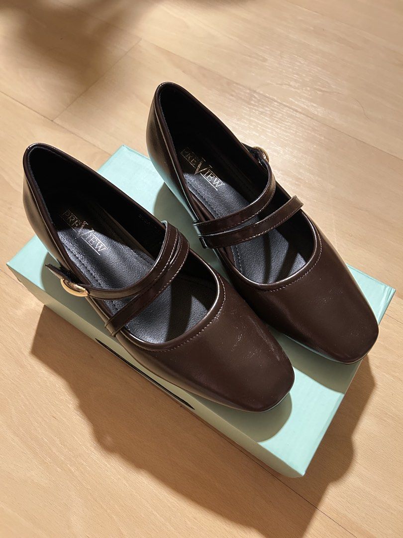 Choco Brown Mary Jane Heels (square toe) - Size 37 (Category: Heels) located in Pasig City. Submitted by stop.look.shop (Listing ID 1465551577, Image 1). Description: Impulse buy from Landmark!! Super comfortable but a bit tight for me :( Got it for ₱1699 but selling it for ₱1499 only Bought this September lang! - Style: Dark brown Mary Jane heels with square toe and block heel - Size: 37 - Details: Double strap design with chic gold buckle hardw