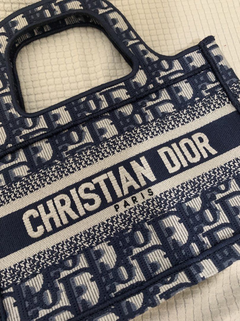 Christian Dior MINI book tote (Category: Luxury Bags & Wallets) located in Surigao. Submitted by luxxbytm.ph (Listing ID 1465457168, Image 3). Description: excellent condition .