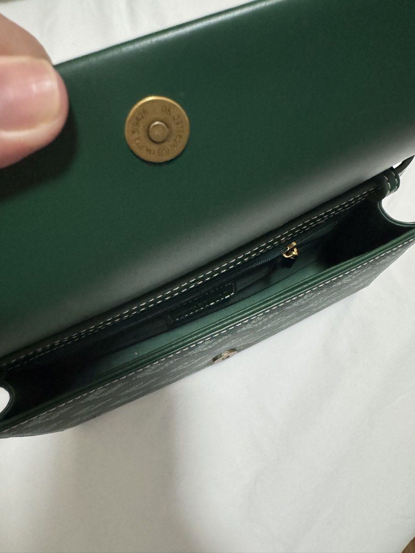 Christy Ng Diego (Category: Cross-body Bags) located in Manila. Submitted by summer.731 (Listing ID 1465444839, Image 3). Description: - Brand: Christy Ng - Style: Crossbody bag with a trendy geometric pattern - Details: Dark green leather trim, white contrast stitching, and premium gold hardware - Closure: Secure flap with a magnetic snap - Interior: Clean lining with a convenient zippered pocket - Condition: Well-maintained and ready to use.