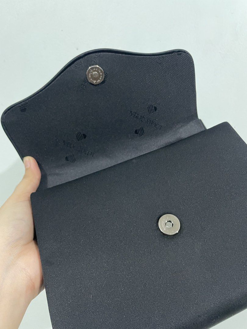 Classic Black Evening Handbag (Category: Shoulder Bags) located in Las Pinas. Submitted by archivedfinds (Listing ID 1465519038, Image 3). Description: Thrifted. Lightly padded with silky texture. Classic and timeless. Perfect for formal events. RFS: Just stored and not used. Pick-up: Grab/Lalamove arranged by buyer. Delivery: LBC/J&T (shipping within 2 days from payment) MOP: Bank Transfer/Instapay/GCash/Maya .
