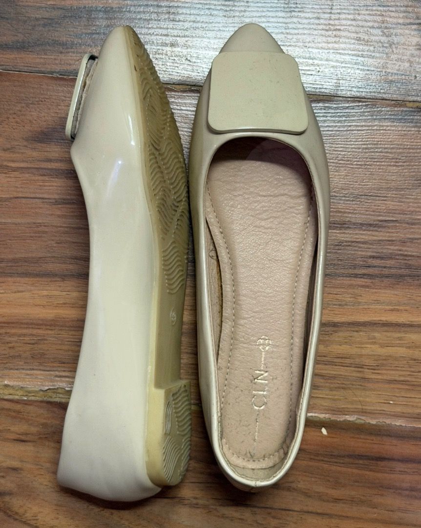 CLN Beige Pointed Toe Flats with Buckle Size 39 (Category: Flats & Sandals) located in Santa Rosa. Submitted by biancamarie0404 (Listing ID 1465434511, Image 2). Description: - Brand: CLN - Style: Pointed toe flats with large square buckle - Color: Beige patent with light pink interior lining - Size: 39 - Features: Cushioned insoles and good grip pattern on soles - Condition: Clean uppers, minor wear on insoles from previous fitting.