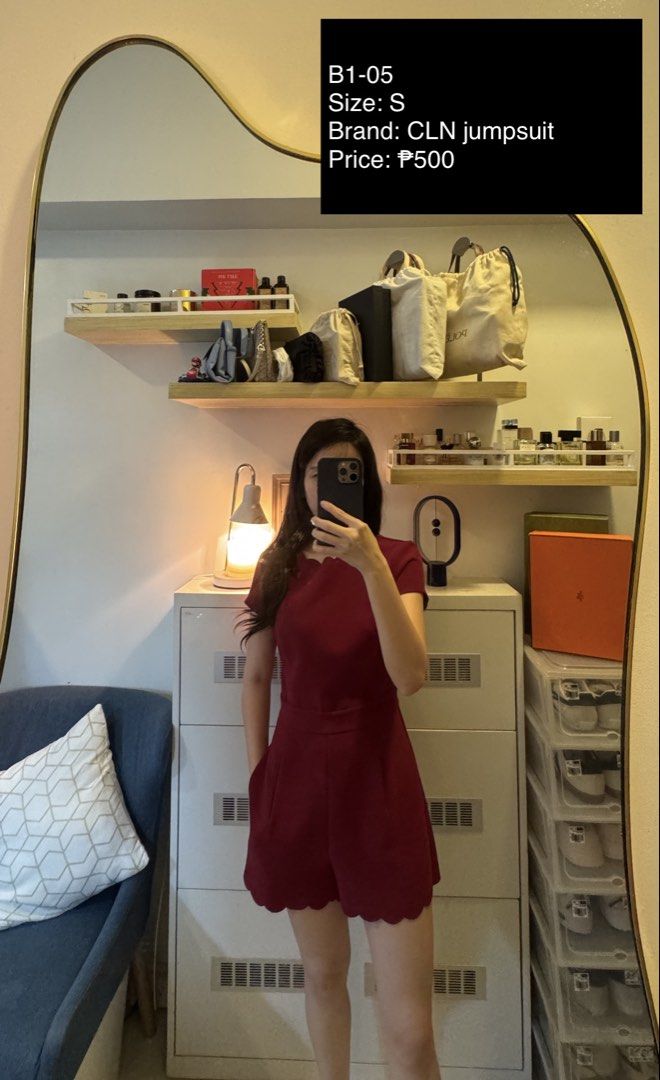 CLN Red Jumpsuit Size S (Category: Jumpsuits) located in Makati City. Submitted by thrift.plethora (Listing ID 1465458293, Image 1). Description: - Brand: CLN - Item: Shorts Jumpsuit - Size: S - Color: Deep red / maroon - Features: Short sleeves, fitted waist, side pockets, and scalloped hem detail - Condition: Excellent - Perfect for: Casual days and weekend outings.