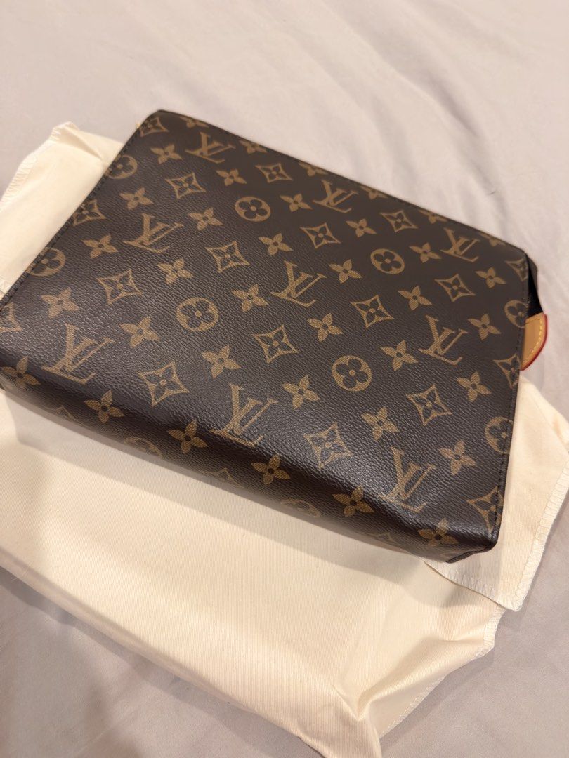 Clutch Monogram (Category: Belt bags, Clutches and Pouches) located in Manila. Submitted by charlieandjacob (Listing ID 1465407498, Image 2). Description: Monogram Mens Clutch Coated Canvass Monogram Comes with dustbag.