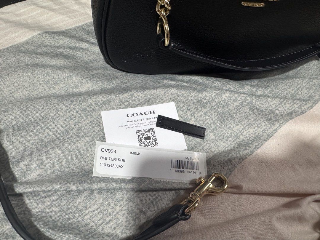 Coach black teri shoulder bag with long strap (Category: Shoulder Bags) located in Manila. Submitted by iamsassycl95926 (Listing ID 1465458687, Image 3). Description: Selling my preloved original coach teri fron SG used once good as new with complete set like care card and tag .