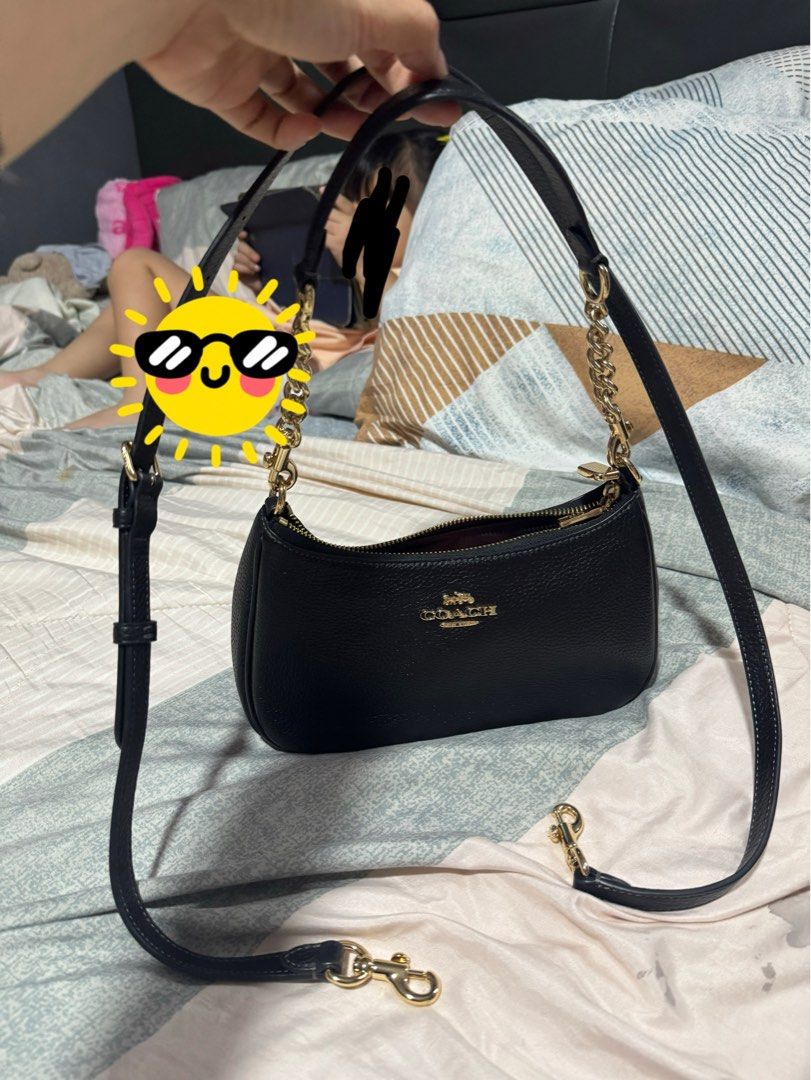 Coach black teri shoulder bag with long strap (Category: Shoulder Bags) located in Manila. Submitted by iamsassycl95926 (Listing ID 1465458687, Image 1). Description: Selling my preloved original coach teri fron SG used once good as new with complete set like care card and tag .