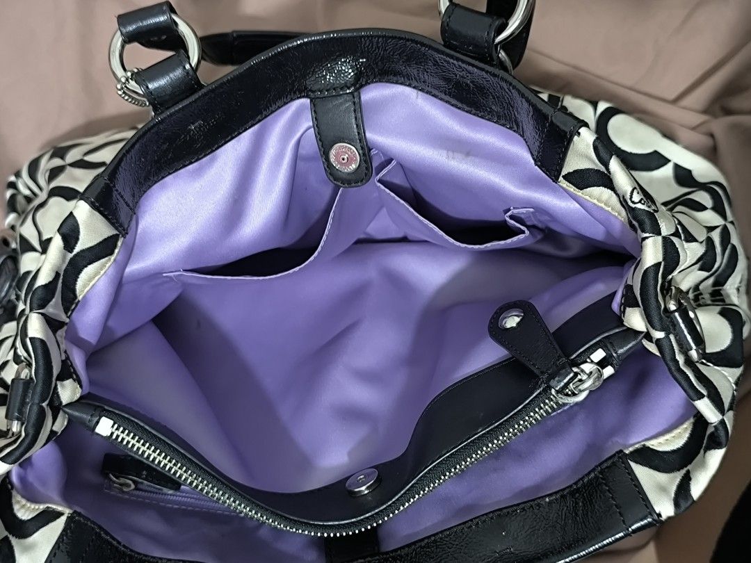 Coach Madison Carryall Satchel Tote (Category: Luxury Bags & Wallets) located in Batangas. Submitted by shoppe.azi (Listing ID 1465499079, Image 3). Description: - authentic with hang tag - bought 5.5k sa korea pasabuy 🥹 - rfs: seller prefers smaller kili bag - mop: gcash - Authentic Coach Tote Bag - Bold black and white signature op art pattern with glossy black patent leather trim - Shiny silver-tone hardware featuring the classic Coach carria