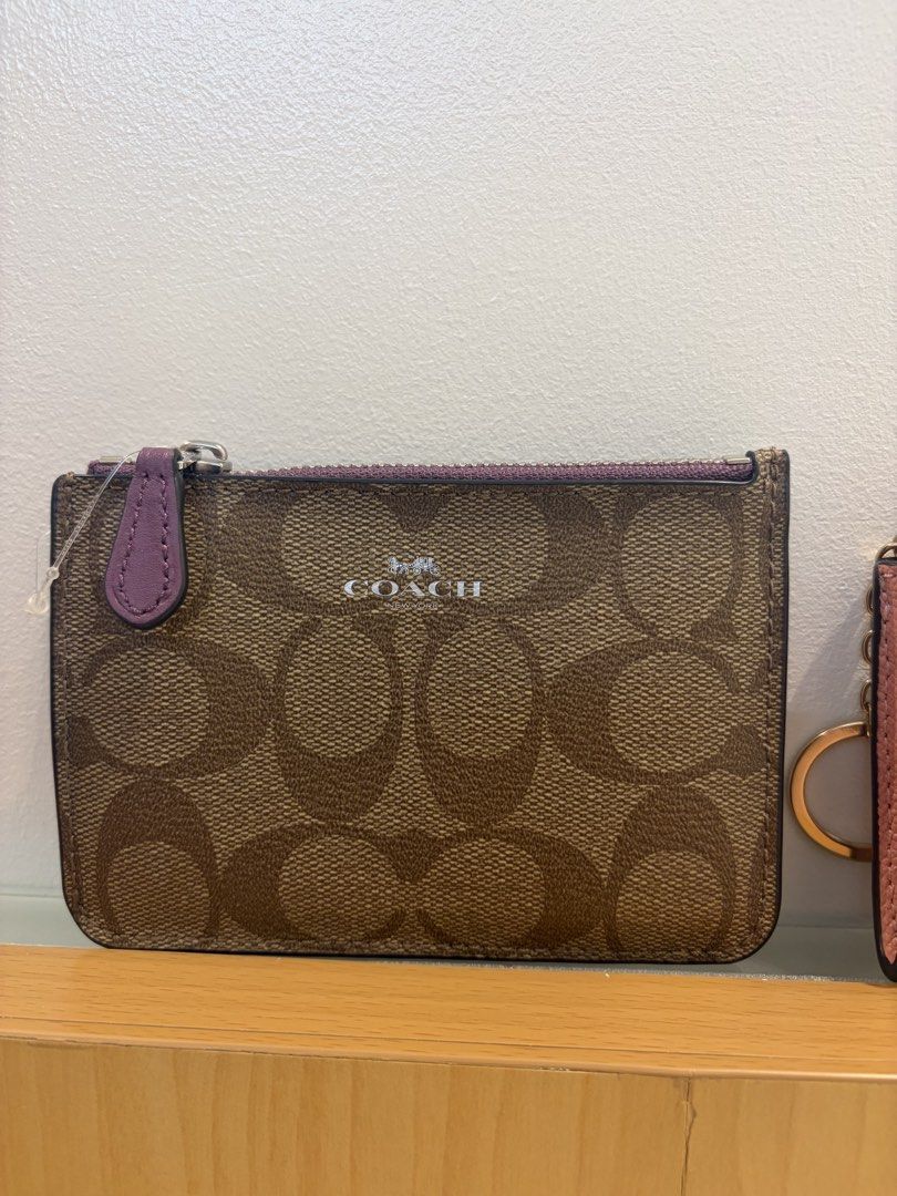 Coach Mini Purse and ID Case (Bundle) (Category: Purses & Pouches) located in Marikina City. Submitted by jlram (Listing ID 1465392058, Image 3). Description: Get both for 2800, used only once. Very good condition; comes with white dust bag.
