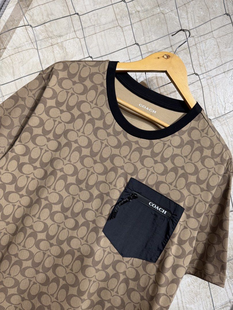 Coach Monogram Brown Pocket Tee. (Category: Tshirts & Polo Shirts ) located in Manila. Submitted by ardobe.mnl (Listing ID 1465534244, Image 2). Description: Size: Large Dimes: 21x27.5 Condition: Excellent Flaw: None! Dm for inquiries! 📥.