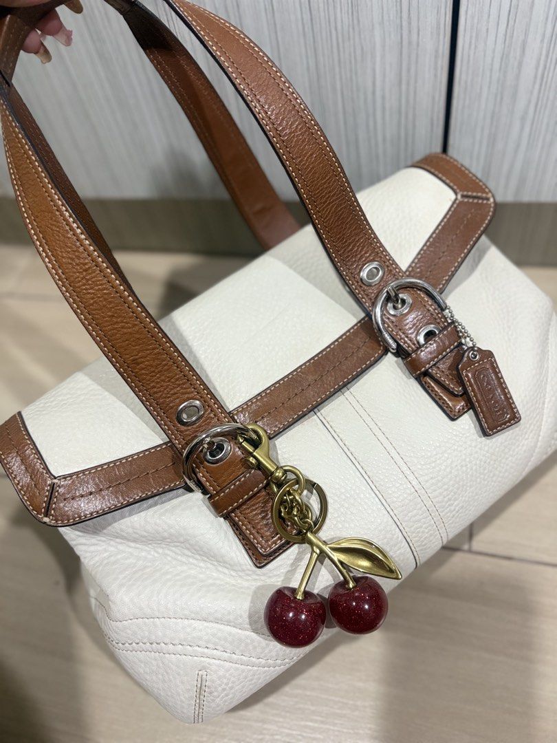 Coach Soho Flap Satchel (Category: Shoulder Bags) located in Lingayen. Submitted by jhaneshop (Listing ID 1465498767, Image 2). Description: Coach Soho Flap Satchel 𐙚 ̊ Style No.: F12304 𐙚 ̊ Creed No.: C0867-F12304 𐙚 ̊ Pebbled leather with leather trim 📝 Condition: Light marks/dirt on the leather, barely noticeable. No major issue 📝 Please purchase only if you’re comfortable with the bag’s actual condition. Kindly refer to the uploaded photo