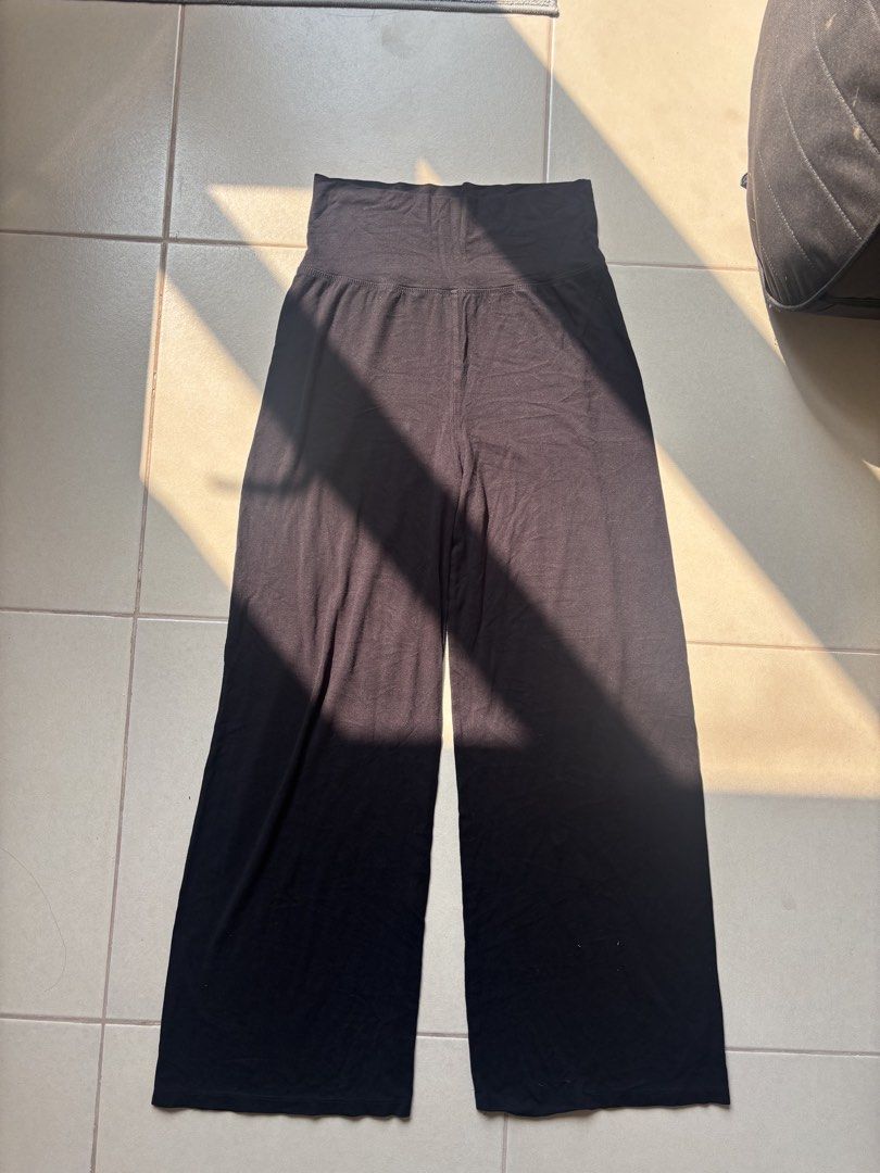 Coco Black Wide Leg Pants Size S (Category: Jeans) located in Quezon City. Submitted by therealpaulsebastian.910 (Listing ID 1465391675, Image 1). Description: - Brand: Coco - Size: S (Tag attached, brand new) - Color: Classic black - Waist: High waist with a smooth fold-over design - Fit: Relaxed through the legs with a nice drape - Material: Soft, stretchy, and comfortable fabric - Versatility: Great for casual outings or cozy lounging at home.
