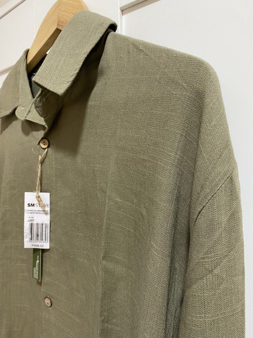 COCO REPUBLIC Olive Long Sleeve (Category: Formal Shirts) located in Quezon City. Submitted by wearhouze (Listing ID 1465478040, Image 2). Description: - Brand: Coco Republic - Color: Olive Green - Size: Large - Condition: Brand new with original SM Store tags attached, never worn - Details: Classic button-down front, structured collar, and stylish textured fabric weave.