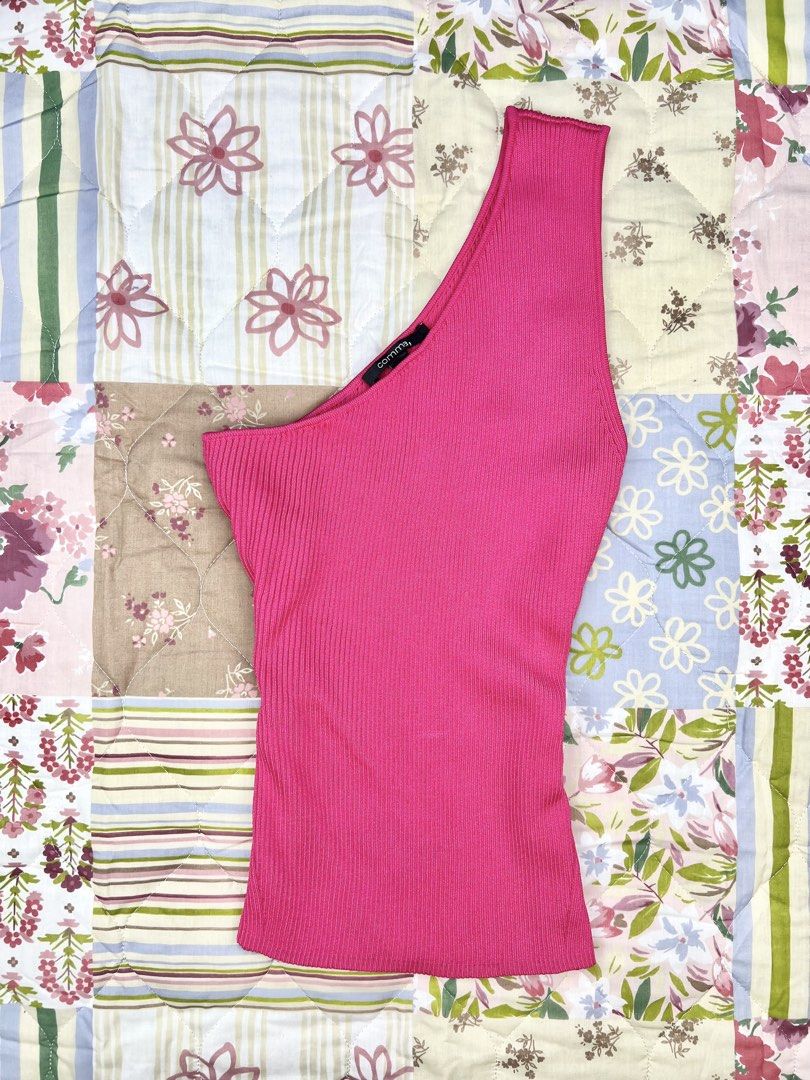 Comma Hot Pink Ribbed One Shoulder Top (Category: Sleeveless) located in Angeles City. Submitted by fruits.ph (Listing ID 1465437267, Image 1). Description: Measurements B:13.5” W:10.5” L:22” Size on Tag: ❌ Best Fit: M-L *Flat lay measurements* Mannequin Size: M (34”; 25”) Color Rate: 10/10 Flaws:None Fabric Type: Knitted Cotton/ Stretchable Fabric ***Color may vary due to lighting. This item is properly washed and disinfected.***.
