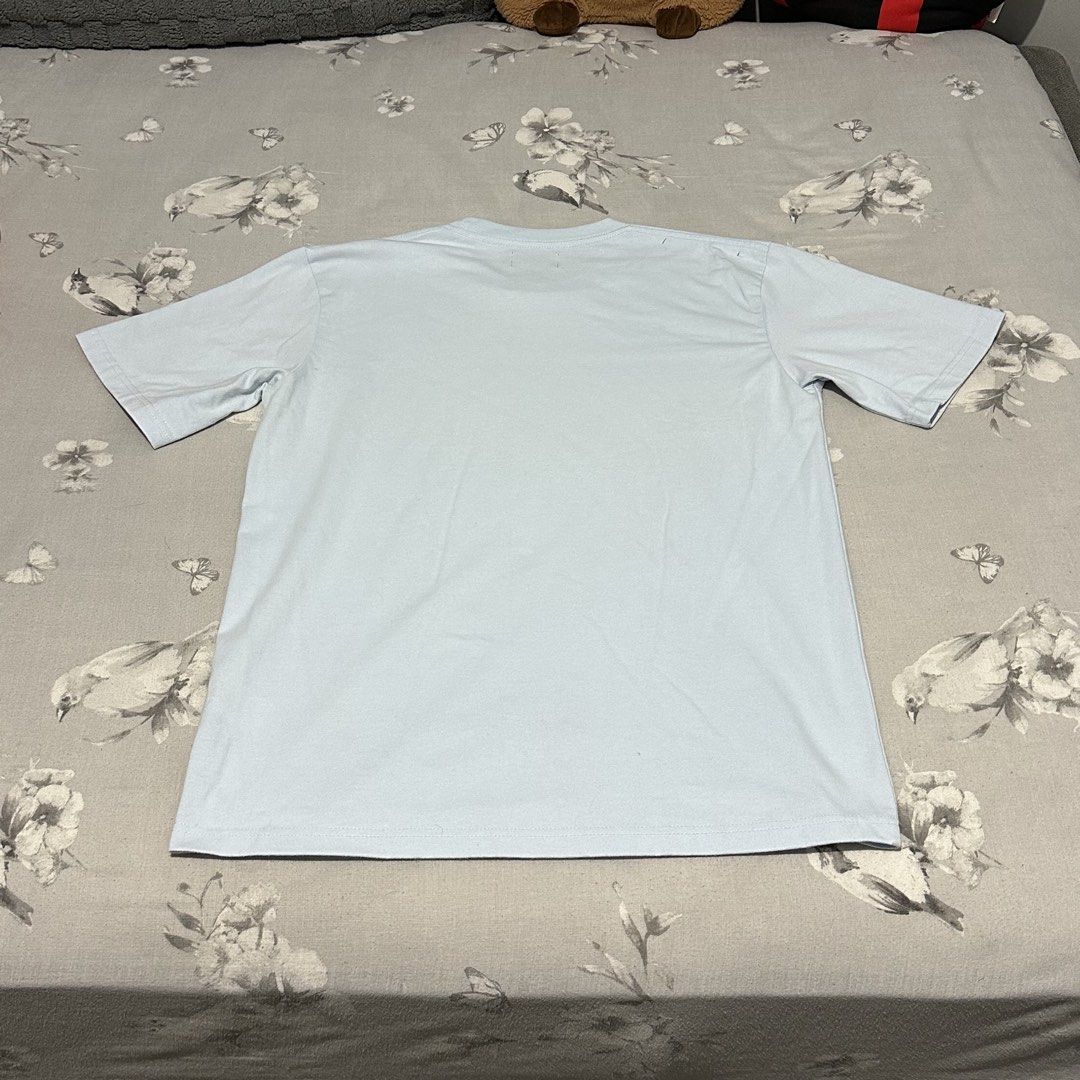 CONCEIT Light Blue Casual T-Shirt (Category: Tshirts & Polo Shirts ) located in Lipa City. Submitted by jecoparra (Listing ID 1465508838, Image 3). Description: - Brand: CONCEIT - Color: Light blue (plain, no prints/graphics) - Fit: Relaxed crew neck with short sleeves - Material: Soft, medium-weight fabric - Condition/Environment: Great everyday basic tee from a smoke-free home.