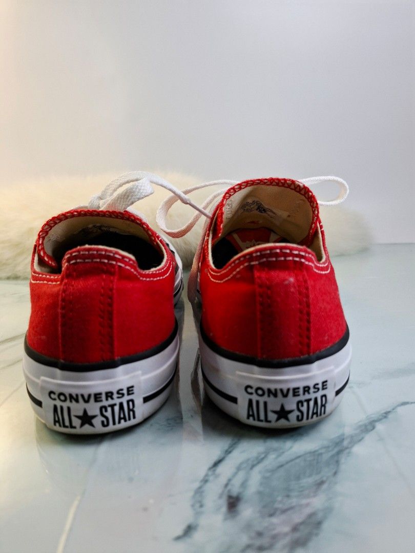 Converse All Star Red Canvas Low Top Sneakers (Category: Sneakers) located in Pasay City. Submitted by onick_79 (Listing ID 1465531415, Image 3). Description: - Authentic Converse All Star low-top sneakers - Eye-catching red canvas upper with white laces - Classic white rubber toe caps and silver-tone metal eyelets - Clean white midsoles featuring signature black piping - Iconic Converse branding on the tongue and heel patch - Perfect casual ever