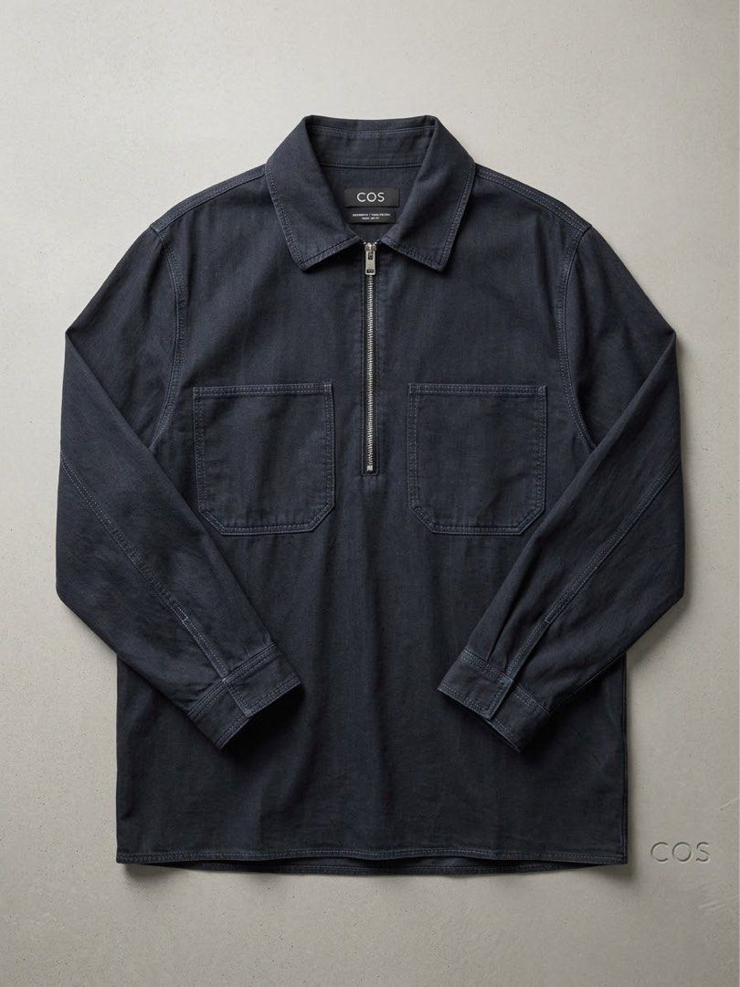 COS Chambray Jacket (Category: Coats, Jackets and Outerwear) located in Quezon City. Submitted by 4seasonshop (Listing ID 1465387424, Image 1). Description: COS Half-Zip Chambray Pullover Jacket – Dark Wash A elevated take on utility style, this COS half-zip jacket is crafted from a soft, dark-wash chambray fabric. Features a clean collared neckline, a sturdy silver-tone zip closure, and two prominent chest patch pockets. Designed with a relaxed,