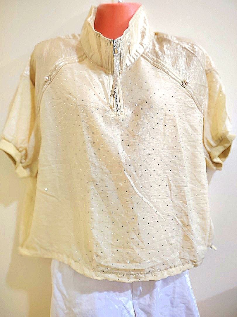 Cream Rhinestone Embellished Half-Zip Blouse Top (Category: Blouses) located in Quezon City. Submitted by timelesstreasure117 (Listing ID 1465552137, Image 1). Description: Can fit from small to medium Good condition. Side can be adjusted. ₱70 Bundle with my other top listings to get discount 5 for ₱300 10 for ₱500 Buyer books courier of choice Payment via gcash or paymaya.