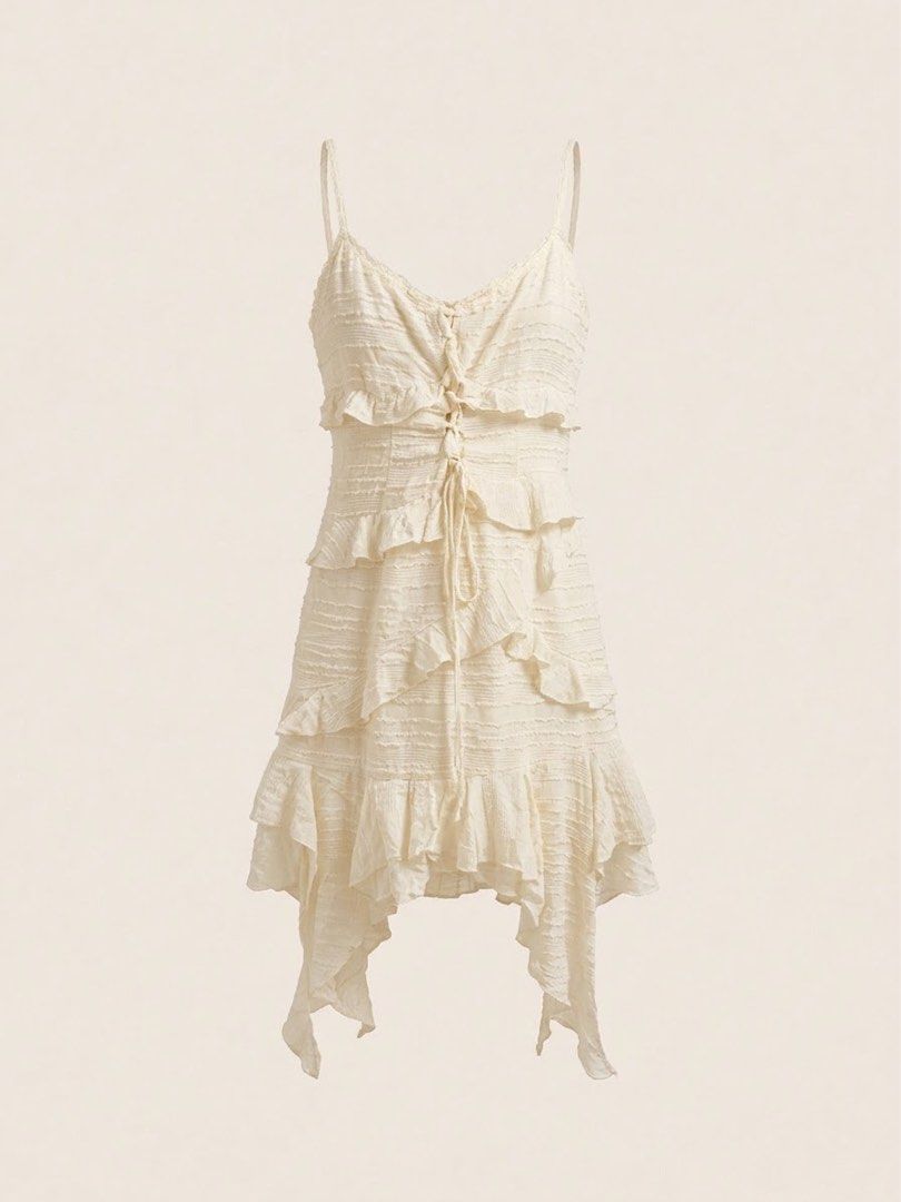 Cream Ruffled Asymmetric Cami Dress (Category: Dresses) located in Manila. Submitted by k.hiii (Listing ID 1465396843, Image 1). Description: - Style: Cream textured mini dress with a slim fit silhouette - Design: Layered front ruffles - Fabric: Crinkle-textured material •Size S-M •📍Sta. Ana, Manila •Pay as you order •MOP: Gcash/UB ‼️STRICTLY NO CANCELLATION WHEN ORDER IS CONFIRMED‼️ .