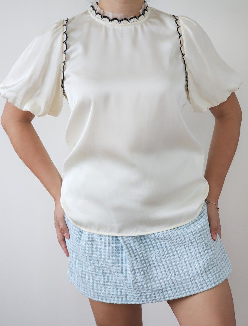 cream satin puff sleeve top (Category: Blouses) located in Batangas. Submitted by curatedbylisilaloop (Listing ID 1465431134, Image 3). Description: fave! instant chic 🤍 | cream satin puff sleeve top with scalloped lace trim details Size: freesize Bust: 38".