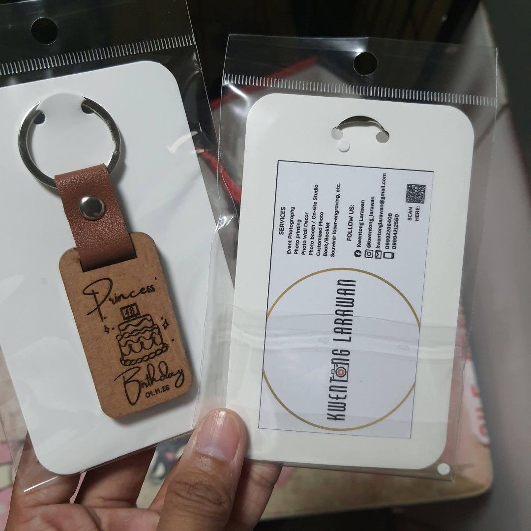 Custom Wooden Leather Strap Keychains Souvenirs (Category: Handmade Craft) located in Tarlac. Submitted by jajubells (Listing ID 1465416833, Image 1). Description: - Product: Customized wooden keychain with brown leather strap and metal ring - Customization: Engraved designs available for birthdays, corporate collaborations , and logos - Packaging: Individually packed in clear plastic bags with backing cards, ready for gifting - Perfect for: Souv