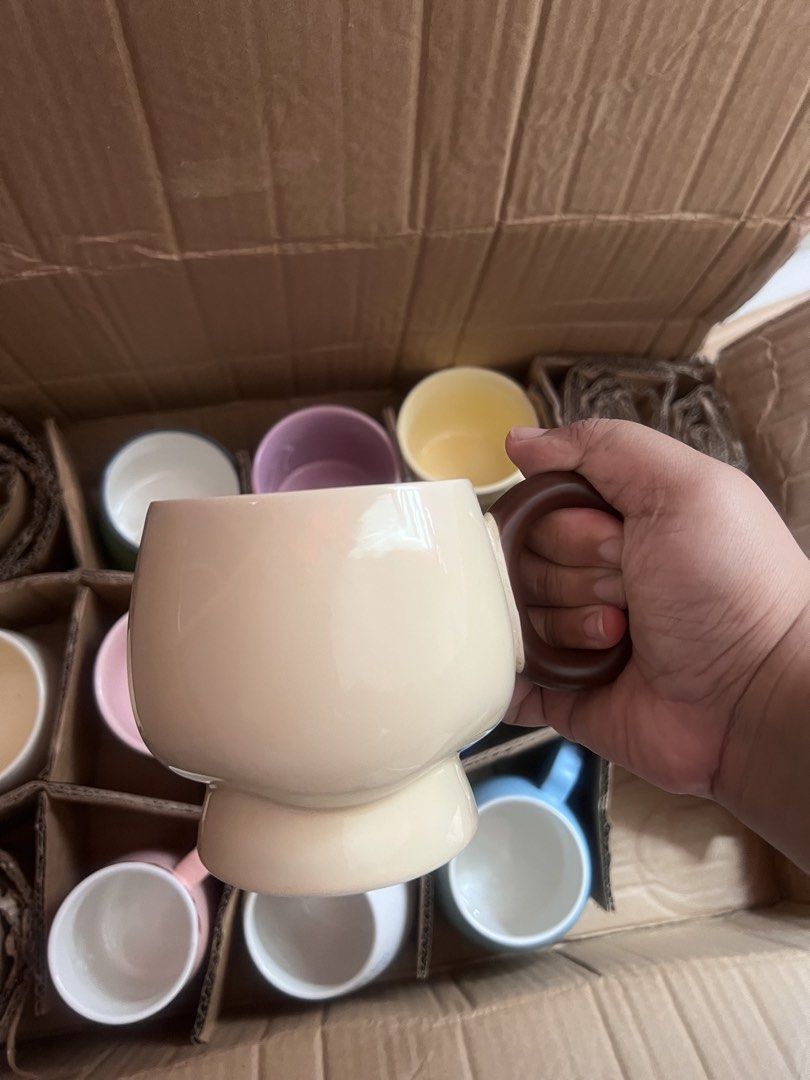 Cute Ceramic Mugs (Category: Coffee & Tea Tableware) located in Taytay. Submitted by wltpf (Listing ID 1465402402, Image 2). Description: - Super cute ceramic mugs in assorted pastel colors and designs - Available styles: Blue with Lion, Solid Cream with Dark Brown Handle, Blue with Daisy, Plain Pink with Red Rim, Pink with Tulip and Bunny - Perfect for coffee, tea, milk, or hot chocolate - Brand new, straight out of the shipping box.
