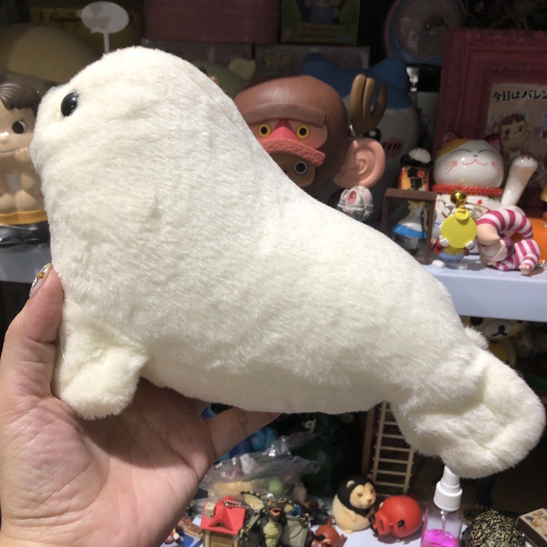 Cute Seal Plush (Category: Plushies & Soft Toys) located in Quezon City. Submitted by kitsune.treasures (Listing ID 1465496085, Image 3). Description: *First to pay policy! *1 day reservation only. Failure to pay on time, auto cancel. 📍Quezon City * MOD: J&T | Lalamove * MOP: GCASH | BPI 📦ON HAND AND READY TO SHIP! CONDITION: WHAT YOU SEE IS WHAT YOU GET. Dimensions: Kindly check the photos for the actual measurements. Please check all the phot