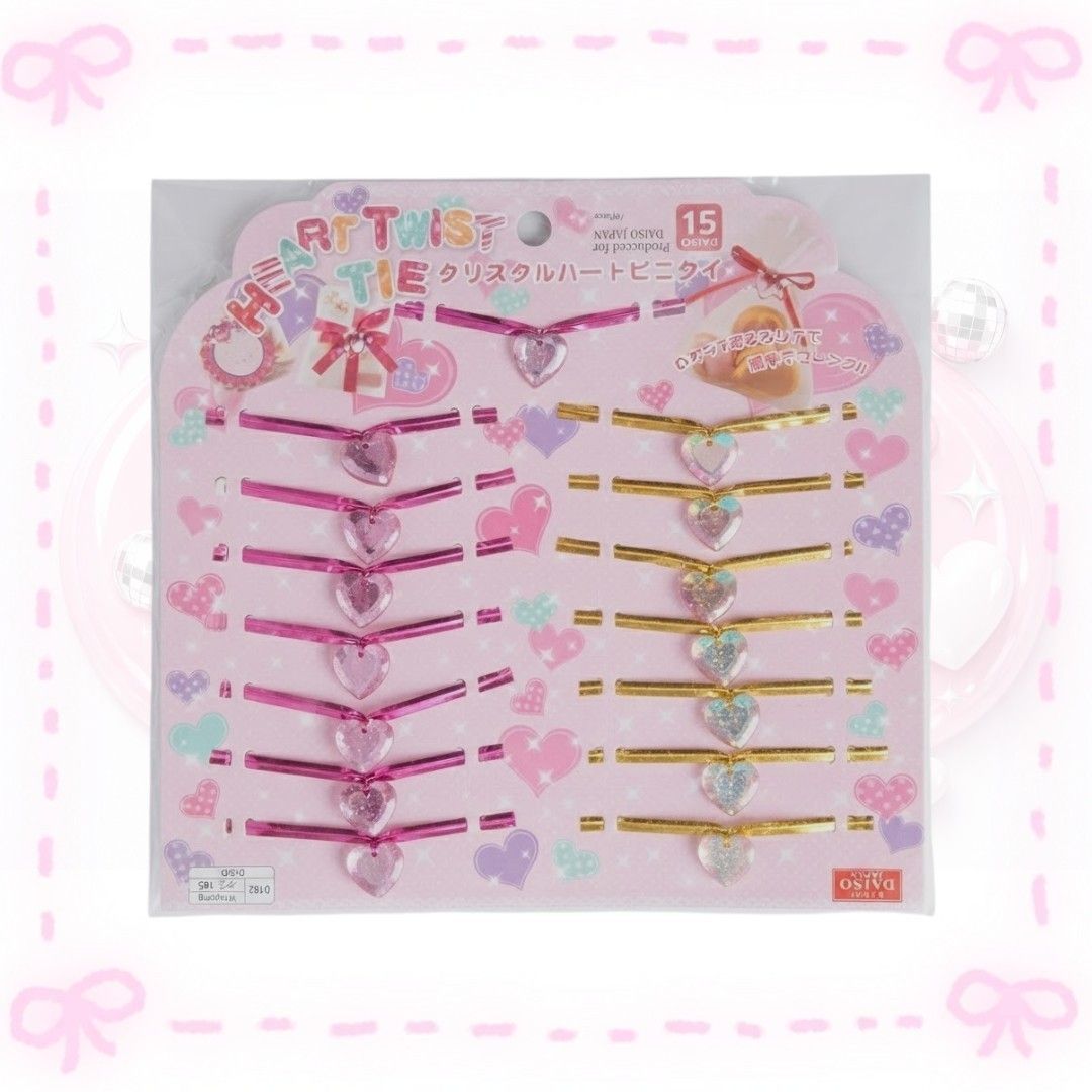 Daiso Heart Twist Tie Pack (Category: Craft Supplies & Tools) located in Sorsogon. Submitted by mitchelle0425 (Listing ID 1465527660, Image 1). Description: - Brand: Daiso - Item: Heart Twist Ties - Colors: Pink and Gold with crystal heart details - Quantity: 15 pieces per pack - Condition: Brand new, unopened, straight from the store - Perfect for: Sealing treat bags, gift wrapping, and DIY craft projects.