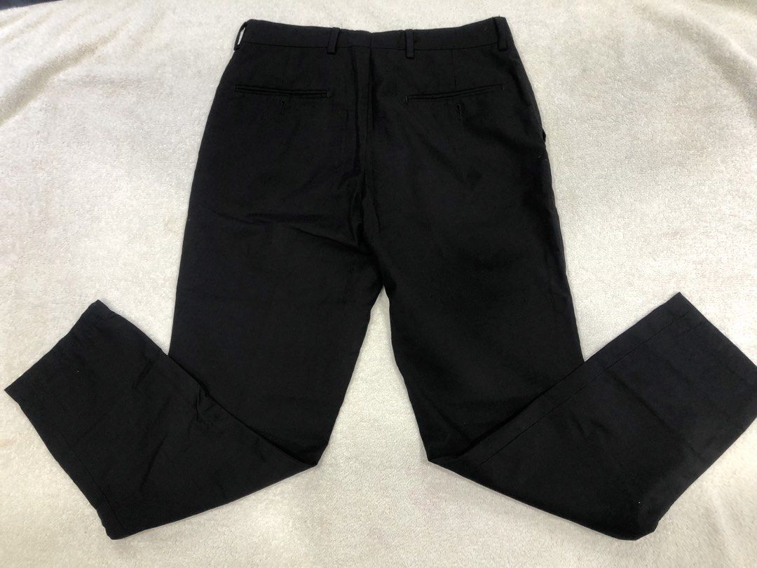 Dansen Slim Fit Black Trousers Size 29 (Category: Trousers) located in Manila. Submitted by janmichael26601 (Listing ID 1465403071, Image 2). Description: - Brand/Model: Dansen slim fit trousers - Color: Solid black - Size: Tagged size 29 - Style: Clean front with button closure and belt loops - Pockets: Two back welt pockets - Measurements: ~37-inch inseam, 6-inch leg opening width - Ideal for: Office wear or smart casual outfits.