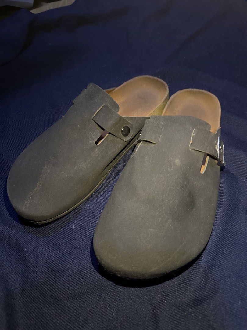 Dark grey slip-on clogs size 40 (Category: Slippers & Slides) located in Mandaluyong City. Submitted by nanokimber71869 (Listing ID 1465560158, Image 2). Description: -Decluttering Sale- negotiable -Brand: Attache - Color: Black - Size: 40 (marked on inner sole) - Features: Adjustable side buckle straps, comfortable cork footbed with brown suede lining, sturdy construction - Condition: Visible wear on suede footbeds and scuff marks on the upper m