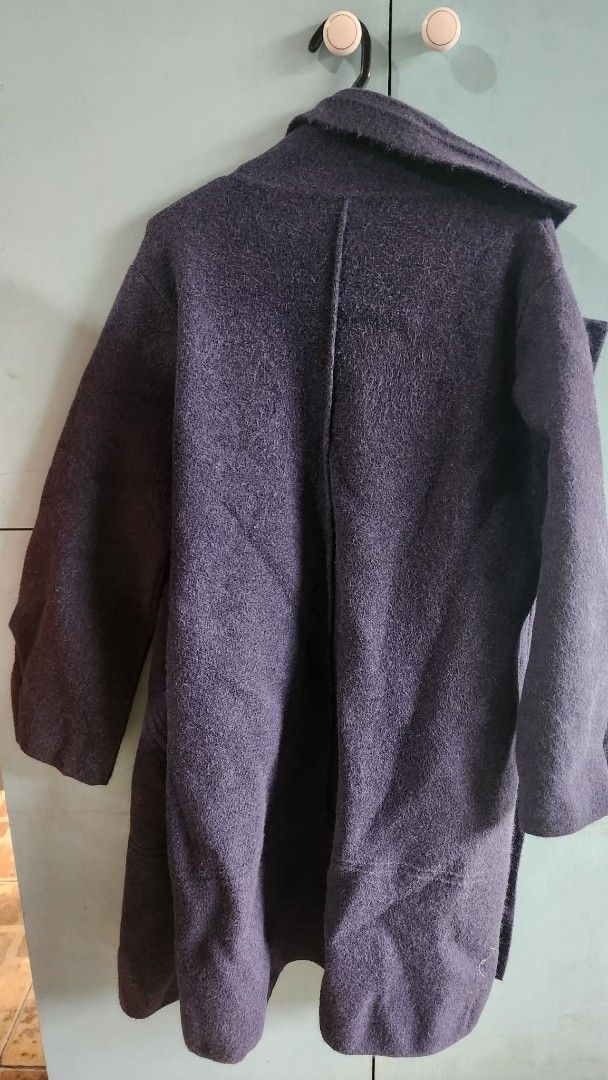 Dark Purple Wool Overcoat with Buttons (Category: Coats, Jackets and Outerwear) located in Paranaque City. Submitted by yumme (Listing ID 1465469351, Image 1). Description: - Dark purple wool-blend overcoat - Classic lapel collar with front button closure - Mid-length cut for extra warmth - Long sleeves with buttoned cuffs - Textured solid fabric finish - Perfect cozy layer for the winter season.