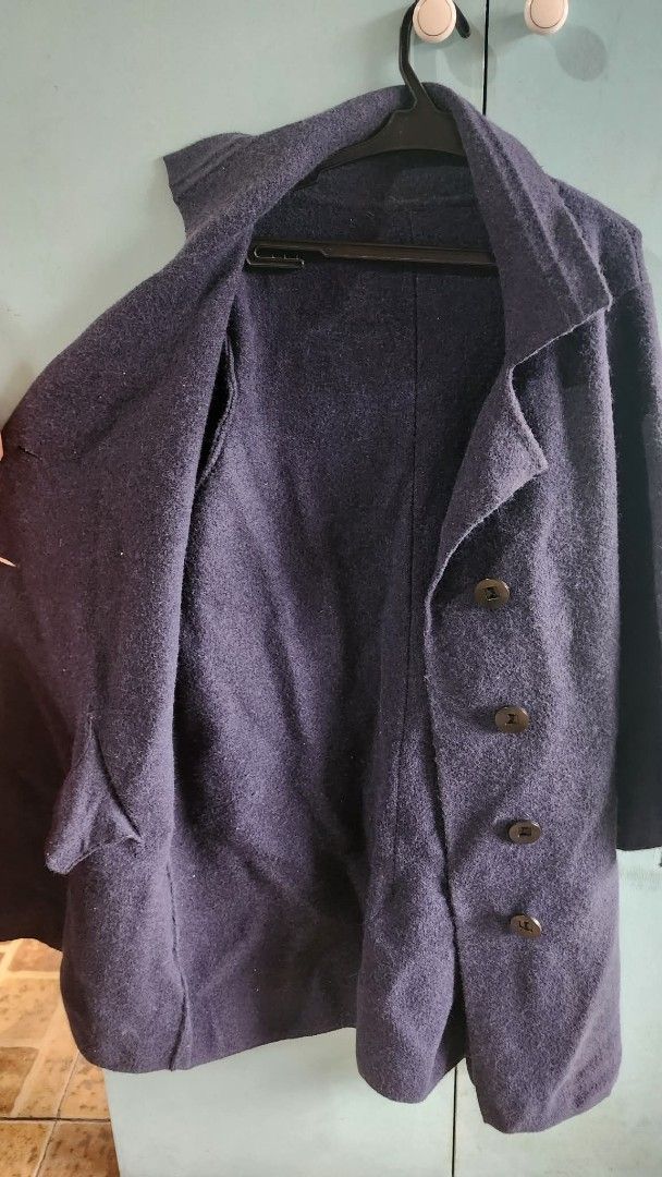Dark Purple Wool Overcoat with Buttons (Category: Coats, Jackets and Outerwear) located in Paranaque City. Submitted by yumme (Listing ID 1465469351, Image 2). Description: - Dark purple wool-blend overcoat - Classic lapel collar with front button closure - Mid-length cut for extra warmth - Long sleeves with buttoned cuffs - Textured solid fabric finish - Perfect cozy layer for the winter season.