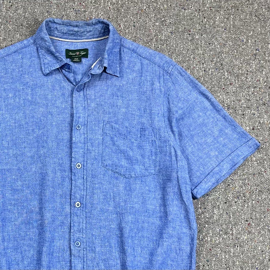 David Taylor Chambray button-down shirt (Category: Tshirts & Polo Shirts ) located in Zamboanga. Submitted by rag_20 (Listing ID 1465547051, Image 2). Description: David Taylor Chambray button-down shirt A chambray blue melange colorway men’s short-sleeve linen-blend button-down shirt It features a standard pointed collar, a singular open patch pocket on the left chest, and a slightly curved casual hemline. Size: Medium 17 Shoulder 21 Width 27 Le