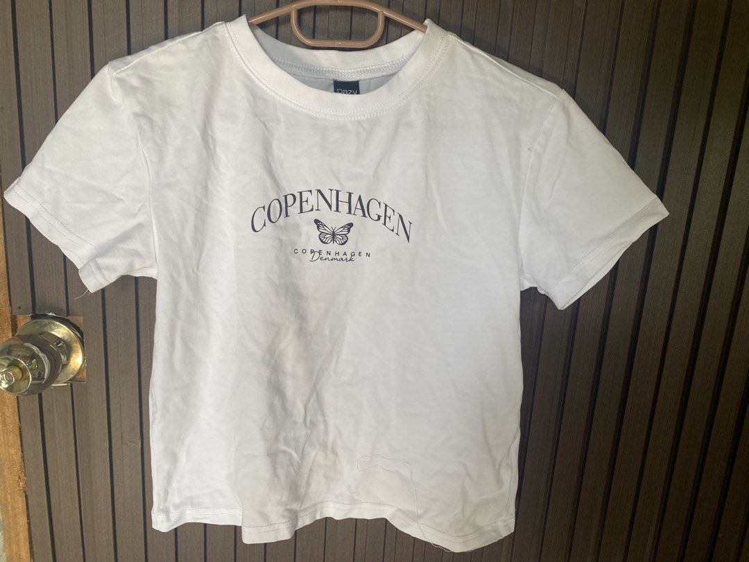 Dazy Copenhagen Denmark White Graphic Tee Size S (Category: Shirts) located in Bayambang. Submitted by meanne._. (Listing ID 1465422496, Image 1). Description: - size S - like new - no flaws - decluttering.