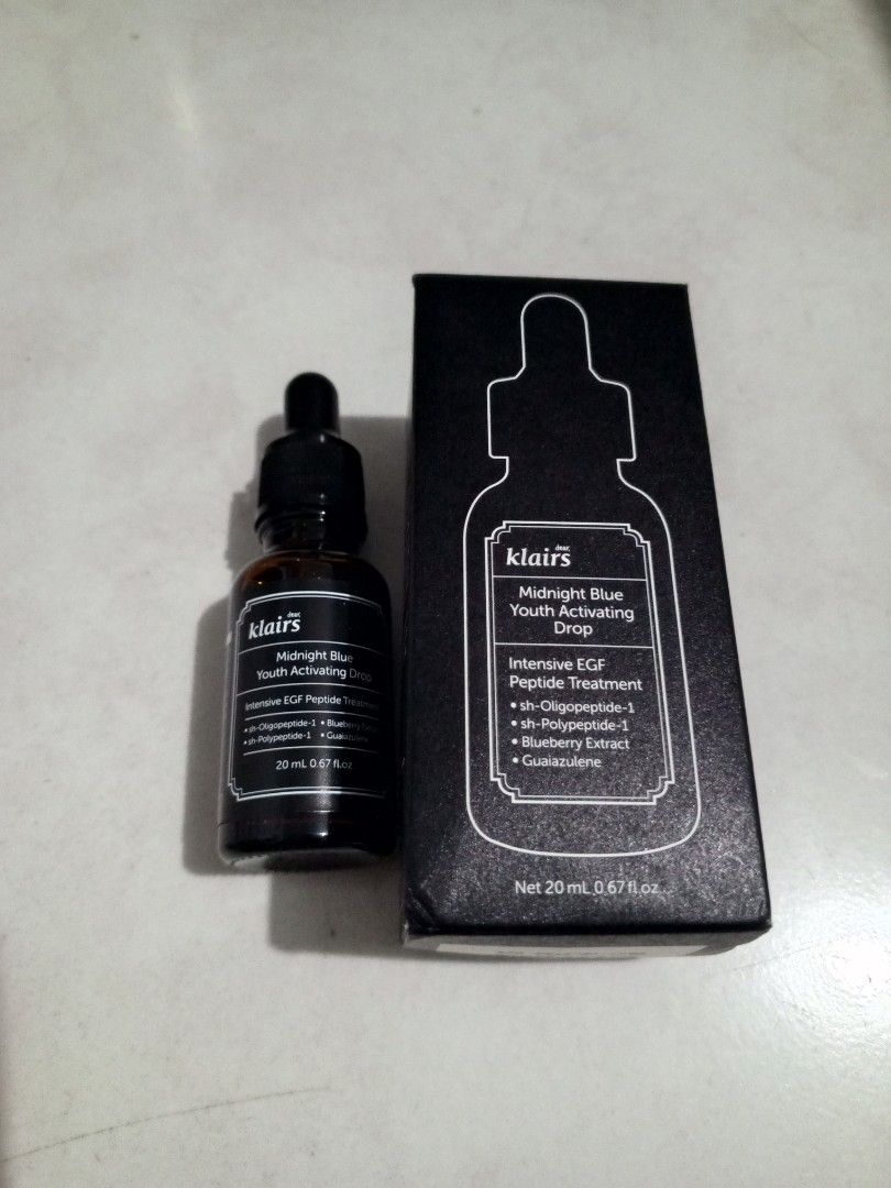 Dear Klairs Midnight Blue Youth Activating Drop 20ml (Category: Face Care) located in Manila. Submitted by yeshaaaaaaa (Listing ID 1465494779, Image 1). Description: Dear Klairs Midnight Blue Youth Activating Drop. 20ml bottle with original black box included. Intensive EGF peptide treatment formulation. Contains sh-Oligopeptide-1, sh-Polypeptide-1, blueberry extract, and guaiazulene. Unopened packaging, box shows crisp white lettering on dark ba